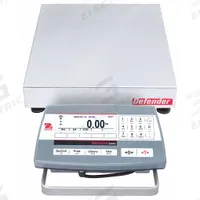 OHAUS Industrial Bench Scale: 12 in x 12 in, Not IP Rated, Front-Mounted, Defender 5000 (MPN 30461648). Key specifications — Connection Ports: RS-232; Readability: 0.001 lb/0.5 g; Brand: OHAUS; Weighing Surface Material: Stainless Steel.