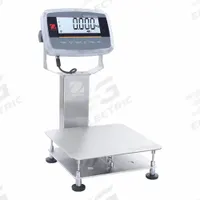 OHAUS Industrial Bench Scale: 11 3/4 in x 11 3/4 in, IP68/IP69K, Column-Mounted, Stainless Steel (MPN D61PW25K1R6). Key specifications — Connection Ports: Infrared Communication Kit; Readability: 0.005 lb/2 g; Brand: OHAUS; Weighing Surface Material: Stainless Steel.