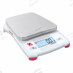 OHAUS Industrial Balance: (3) AA Batteries, 5 in x 5 5/8 in, Not IP Rated, Not NTEP Rated (MPN CX1201). Key specifications — Readability: 0.1 g; Power Source: Battery; Weighing Units: lb/oz; Brand: OHAUS; Washdown: No.