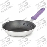 VOLLRATH Fry Pan: Non-Stick, 7 in Top Dia, Aluminum, Black/Silver, Silicone, NSF Certified, Aluminum (MPN T400780). Key specifications — Brand: VOLLRATH; Handle Color: Purple; NSF Certified: Yes; Product Type: Fry Pan; Body Color: Black/Silver; Handle Material: Silicone; Body Material: Aluminum; Handle Type: Riveted.