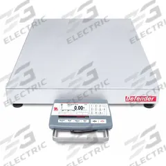 OHAUS Industrial Bench Scale: 24 in x 24 in, Not IP Rated, Column-Mounted, Defender 5000 (MPN 30467606). Key specifications — Connection Ports: 2 In/4 Out Discrete I/O; Readability: 0.02 lb/10 g; Brand: OHAUS; Weighing Surface Material: Stainless Steel.