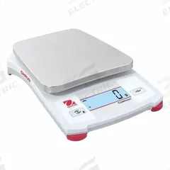 OHAUS Industrial Balance: (3) AA Batteries, 5 in x 5 5/8 in, Not IP Rated, Not NTEP Rated (MPN CX5200). Key specifications — Readability: 1 g; Power Source: Electric; Weighing Units: lb/oz; Brand: OHAUS; Washdown: No.