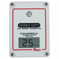 Wall-mounted fixed gas detector transmitter for nitrogen dioxide (NO2) with a measurement range of 0 to 10 ppm. Features a digital display and is designed for use with building management controllers. Provides continuous gas monitoring for facility environments