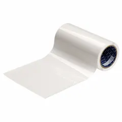 Clear acrylic laminate roll with permanent adhesive, measuring 6 3/8 inches high by 8 1/2 inches wide. Applied over printed labels to protect against abrasion, chemicals, and moisture in industrial environments.