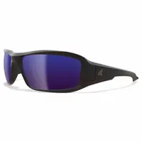Full-frame safety glasses with blue mirrored lenses and a black/red padded comfort-fit frame. Metal detectable and X-ray detectable construction supports use in environments requiring foreign-object contamination control, such as food processing and pharmaceutical facilities. The mirrored lens coating reduces glare for improved visual clarity