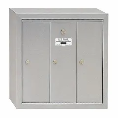 This vertical multi-unit mailbox features three lockable front-access doors for secure mail distribution. Designed for surface mounting, it measures 19 inches high, 18 3/4 inches wide, and 7 1/2 inches deep. Suitable for apartment buildings, condominiums, or commercial facilities requiring multiple mail compartments.