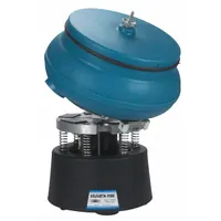 This RAYTECH vibratory tumbler features a drain/tilting plate and adjustable bowl amplitude for wet or dry operation. It is used for deburring, polishing, and surface finishing of metal and plastic parts in manufacturing and machine shops