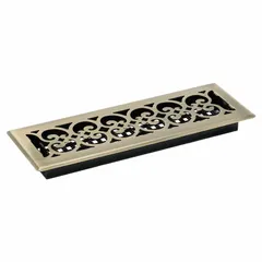 This floor register features a decorative brass steel grille with an antiqued finish. It measures 15-1/2 inches in height and 5-1/2 inches in width, with non-adjustable blades directing airflow in one direction. Suitable for fixed air distribution in flooring systems where a single airflow path is desired.