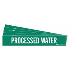 Green adhesive pipe marker with white legend text reading 'Processed Water'. Designed for pipe outer diameters of 8 inches and larger. Each pack contains one marker without arrows. Used for identifying processed water lines in piping systems.