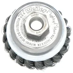This cup brush from WEILER is designed for heavy cleaning of contoured carbon steel surfaces. It features standard twist knot wire bristles with a fill diameter of 0.014 in and a brush diameter of 2-3/4 in. The brush mounts via a 1/2-13 arbor hole for secure attachment to compatible tools, making it suitable for aggressive surface preparation tasks such as removing rust, scale, and weld splatter.