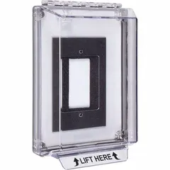 This clear polycarbonate guard is designed for outdoor wall-mounted emergency buttons. It features a LIFT HERE legend and includes mounting hardware for flush installation. Rated IP56 and NEMA 3RX, it provides waterproof protection against vandalism and accidental damage. Overall depth is 1 15/16 inches.