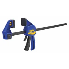 This dual-function tool operates as both a clamp and a spreader with a one-handed trigger mechanism. It has a max jaw opening of 24 in, a range of 7 7/8 in to 31 3/8 in, and a throat depth of 3 1/4 in. Used in woodworking, metalworking, and construction for holding workpieces during gluing, assembly, or welding.