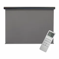 Motorized outdoor shade with gray fabric and oil-rubbed bronze valance. Features 90% UV protection and a cable tie-down system for stability. Operates via remote control. Suitable for patios, decks, and similar outdoor areas.