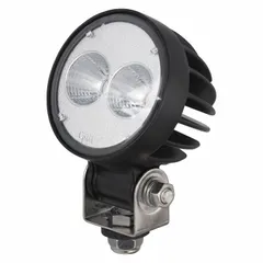 This GROTE LED floodlight provides focused illumination for work-area lighting on vehicles and industrial equipment. It features a black housing, surface mount design, and a removable bracket with pigtail electrical connection for universal installation.