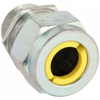 Straight metallic cable grip with 3/4 in MNPT box connection, steel body, and silver finish. Accepts cord diameters from 0.63 in to 0.75 in, features a yellow color-coded grommet, and measures 1 15/16 in overall length. Rated IP66 and Class II, Division 1 & 2 for hazardous locations. Suitable for sealing and securing cords in industrial environments where dust or combustible dusts may be present
