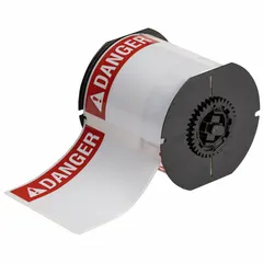 White polyester precut label roll with rubber adhesive for indoor/outdoor use. Halogen-free material compatible with BBP33 printer series. Used for creating durable danger warnings in industrial environments to communicate hazards clearly.