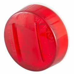 Round red LED clearance light with grommet mount and PL-10 connector. 2-inch overall diameter. SAE lens code PC. Used on trucks, trailers, and heavy equipment for marking vehicle width and height.