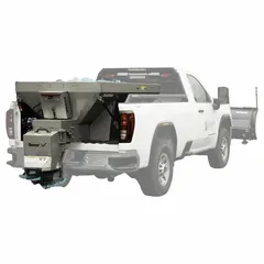Truck-mounted broadcast spreader with 3,120 lb capacity and 40 ft max spread width. Constructed with stainless steel and poly components. Used for spreading salt, sand, or ice melt on roads, parking lots, and driveways in winter maintenance operations.