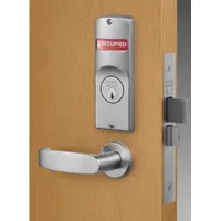 Chrome lever-type outside trim for exit push bars, suitable for doors up to 48 inches wide. Features an indicator-style exit device and is ADA compliant. Not ligature-resistant