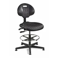 This armless drafting chair features a black nylon frame and a tilting back. Seat width is 18 1/2 inches and seat depth is 17 inches. The armless design allows unrestricted movement, suitable for use at drafting tables and workstations in technical drawing, design, or assembly tasks