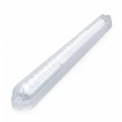 Rectangular clear LED courtesy light for 12V DC systems. Surface-mount design with blunt-cut electrical connection. Provides low-level illumination for vehicle interiors, cabs, compartments, and work areas.
