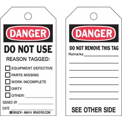 White write-on-surface lockout/tagout tags with pre-printed reasons including Equipment Defective, Parts Missing, Work Incomplete, Dirty, and Other. Each tag includes fields for Signed By, Date, and Remarks. Pack of 10 tags with cable-tie fasteners for attaching to equipment during maintenance or repair procedures.
