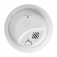 Hardwired ionization smoke detector for residential and light commercial fire safety. Operates at 120V AC with a removable 9V battery backup. Features a latching alarm indicator, test button, and 85 dB sound alert at 10 ft. Includes Easy Adapter Plug and meets UL 217 8th Edition standards