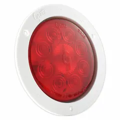 Red LED stop light with a round shape and flange mount. Overall diameter and height are 5 9/16 inches. Pigtail electrical connection. Complies with FMVSS 108. Used on trucks, trailers, and heavy equipment for brake and turn signaling.