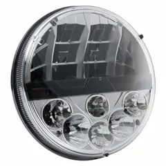 Round LED sealed beam headlight providing both high and low beam functions. Non-heated design with an H4 electrical connector. Suitable for use as a replacement headlight in heavy-duty trucks, off-road vehicles, and industrial equipment requiring a standard round headlight form factor.