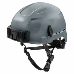 This MILWAUKEE climbing helmet is a Type 2, Class E model made of polyethylene with a gray solid finish. It features a ratchet suspension adjustment and a headlamp mount. Suitable for work-at-height and industrial head protection applications.