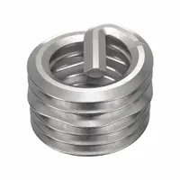 Screw-locking tanged helical insert for repairing or reinforcing threaded holes in metal. Features 1/4"-28 fine thread, 18-8 material grade, and tensile strength of 200,000 to 250,000 psi. Plain finish, right-hand thread, 100-piece pack