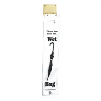 Wall-mount umbrella bag holder in satin brass finish. Overall height 4 in, one-sided capacity. Designed for commercial or residential entryways to hold wet umbrella bags