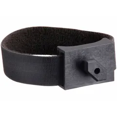 This twist-in cable block is made of polyamide and designed for single extrusion profiles in the Fath 45 Series. It includes a hook and loop strap adjustable from 10 to 60 mm for securing cables. The block is metric, unfinished, and does not include fasteners. Typical applications include routing and organizing cables along structural framing in industrial setups.