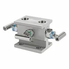 This 3-valve manifold features flange inlet and flange outlet connections, rated for 6000 psi. Constructed with PTFE components, it is used in industrial fluid systems for isolating, redirecting, or combining flow.