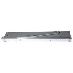 This Grade 1 heavy-duty concealed-mount door closer is constructed of aluminum and features a non-hold open track arm with adjustable spring size 5. It is ADA compliant and suitable for interior or exterior use on commercial or industrial doors requiring controlled closing.