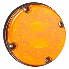 This GROTE LED turn signal light features an amber round lens with a 7-inch overall diameter and height. It is permanently mounted via a bracket and connects with a bullet male pin. Compliant with FMVSS 108 standards, it is used on vehicles to indicate turning or hazard intentions.