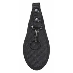 This black nylon ballistic key pouch measures 7 1/4 inches by 82 mm and features a snap closure for secure key retention. It is designed to organize and protect keys in industrial or tactical settings where quick access is needed.