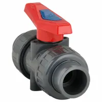 This 1-inch PVC ball valve features a straight, standard-port design with socket x FNPT connections and a lever handle for manual operation. It is used for on/off or redirecting flow in water, chemical, and light slurry applications within industrial piping systems