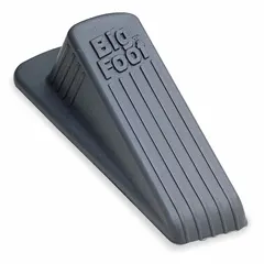This wedge door holder from MASTER is designed to hold doors open in commercial and industrial settings. It measures 2-1/4 inches wide and 1-1/4 inches in overall height, with a gray finish. The compact profile suits standard door gaps for temporary door stopping.