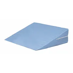This bed wedge is constructed with a cotton/polyester cover over a foam core. Overall dimensions are 24 inches in length, 24 inches in width, and 12 inches in height. It is used to provide positioning and support for the upper body or legs during rest.