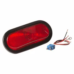 Red oval incandescent stop light with grommet mount and pigtail electrical connection. Complies with FMVSS 108. Overall height 2 1/4 in. Designed for permanent installation on vehicles requiring stop light functions.