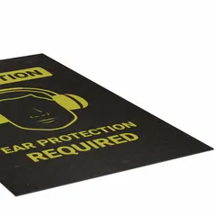 This 3 ft x 5 ft polypropylene mat with adhesive backing and 1/8 in thickness is designed for indoor use at facility entrances to communicate mandatory ear protection zones. Suitable for areas where hearing protection is required, such as near machinery or equipment.