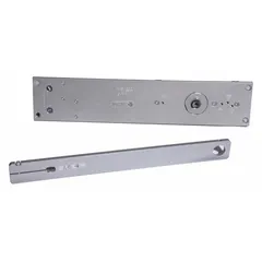 This LCN 6030 Series concealed-mount door closer is Grade 1 heavy duty, constructed of aluminum, and measures 23 5/8 inches in length. It features a non-hold open track arm with an adjustable spring size 5, suitable for interior or exterior use. The closer is ADA compliant and designed for automatic door control in commercial applications.