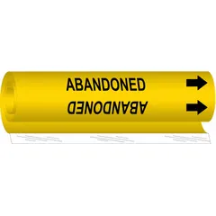 Yellow wrap-around pipe marker with black legend reading 'Abandoned' and directional arrows. Fits pipe outer diameters from 1/2 to 1-3/8 inches. Used to identify piping no longer in service, preventing accidental use or confusion during maintenance.