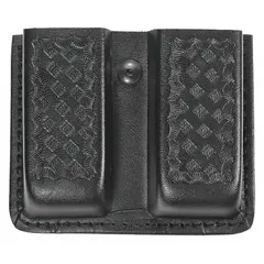 This duty equipment pouch is constructed from black synthetic leather with a basket weave finish. It measures 3 3/4 inches by 1 7/16 inches and is designed to hold magazines for security or tactical use. The pouch can be carried on a belt or duty rig.