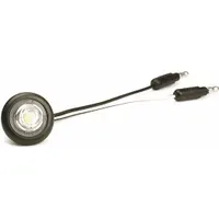 LED clearance light with round shape and clear lens. Surface mount with grommet installation. Features male bullet connector. SAE lens code PC. Used as side marker or clearance light on trucks, trailers, and heavy equipment