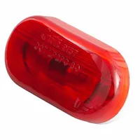 This incandescent clearance light features a red oval lens and a bracket mount for secure attachment. It is equipped with blunt cut wires for electrical connection and meets SAE PC lens code requirements. Typical applications include use as a side or rear marker lamp on trailers, trucks, and heavy equipment to indicate vehicle width and position