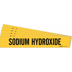 Yellow adhesive pipe marker with black legend reading 'Sodium Hydroxide' for identifying piping carrying caustic solutions. Fits pipe outer diameters from 2-1/2 to 7-7/8 inches. Supplied without arrows in a 5-pack. Used in industrial facilities for safety and compliance with standard color-coding requirements.
