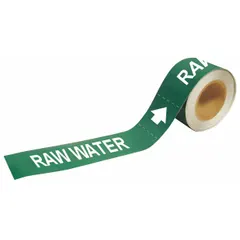 Green adhesive pipe markers with white legend reading 'Raw Water' and directional arrows. Each marker fits pipe outer diameters of 1-1/2 to 2 inches. Supplied 25 markers per roll. Used to identify pipes carrying untreated water in industrial piping systems.