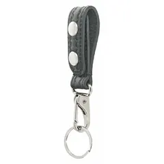 This leather key pouch features a basket-weave finish and measures 6 1/4 inches by 29 mm. It includes a snap closure to secure keys. Suitable for organizing and carrying keys in pockets or bags.